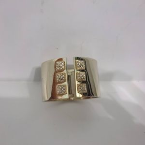 Rhinestone-accented gold Victoria's Secret wide cuff bracelet